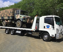 Asset Towing will safely transport army vehicles
